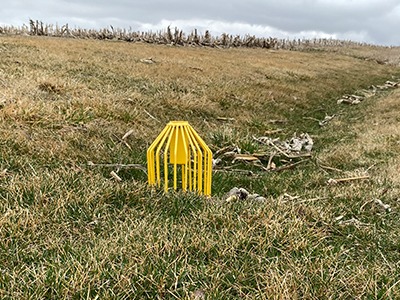 Precision Intakes Trash Can installed in field